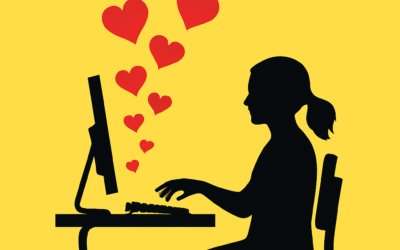 Woman sitting in front of a computer with hearts floating from the screen.